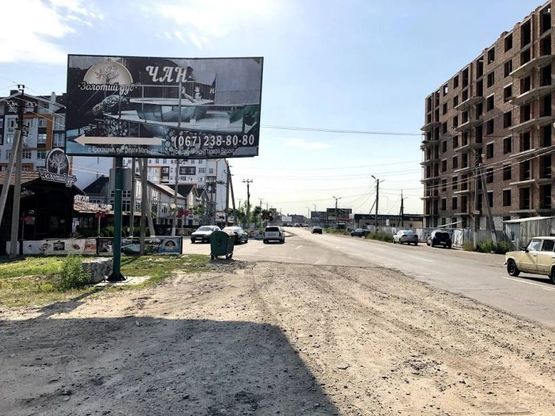 Фото рекламной плоскости по адресу Ул. Одесская ( возле ресторана Золотой Дуб)