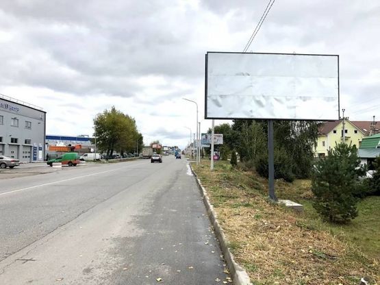Фото рекламної площини за адресою ул. Белогородская , Перед поворотом на ул. Виноградная
