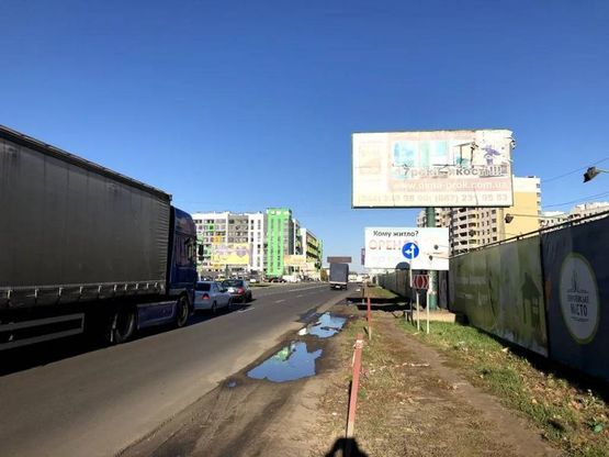 Фото рекламной плоскости по адресу Ул. Василия Стуса , напротив ЖК Акварели 2 , напротив NOVUS Фото рекламной плоскости по адресу Ул. Василия Стуса , напротив ЖК Акварели 2 , напротив NOVUS