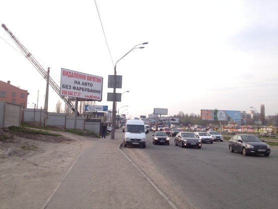 Фото рекламной плоскости по адресу Кольцевая дорога, перед салоном Автозаз