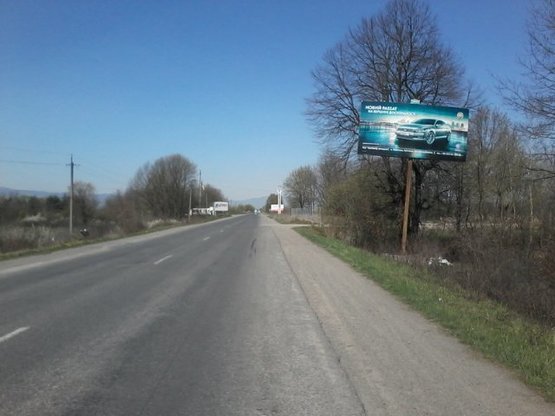 Фото рекламной плоскости по адресу МЕЖА Тячівського та Хустського району, виїзд в сторону м.Хуст на висоті 9 м
