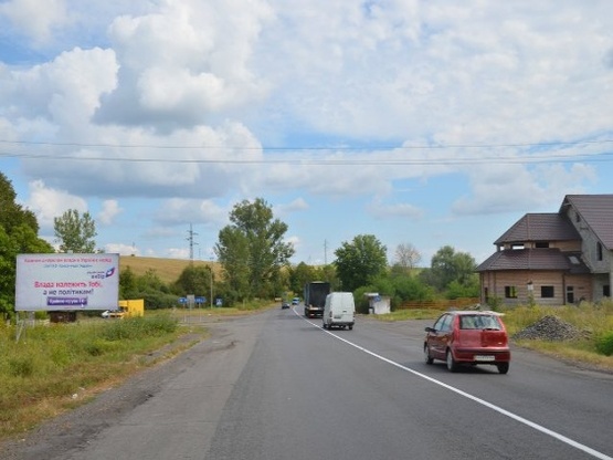 Фото рекламной плоскости по адресу с.Доробратово, вул.Головна, траса Мукачево-Івано-Франківськ