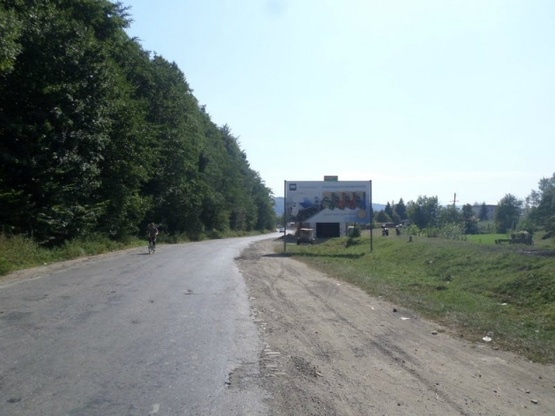 Фото рекламной плоскости по адресу смт.Дубове вул.Головна, виїзд в сторону м.Тячів, вул.Головна