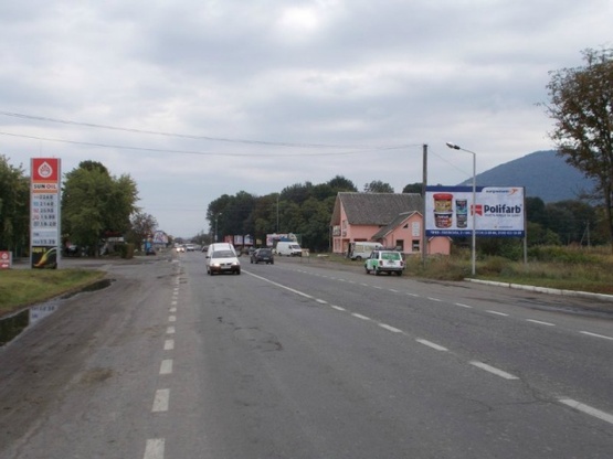 Фото рекламной плоскости по адресу м. Тячів вул. Армійська,  біля стадіону,  ресторан «Оксана» та автомийки Мукачево-Рогатин Фото рекламной плоскости по адресу м. Тячів вул. Армійська,  біля стадіону,  ресторан «Оксана» та автомийки Мукачево-Рогатин