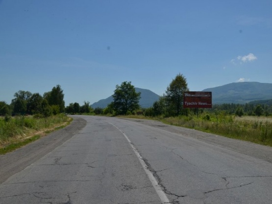 Фото рекламной плоскости по адресу Траса Мукачево-Рогатин між смт. Буштино та м. Тячів, в сторону м. Рахів