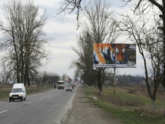 Фото рекламной плоскости по адресу В'їзд в м. Тячів, біля АЗС UPG, Маркет, супермаркету Барва  зі сторони м. Хуст, траса Мукачево-Рогатин