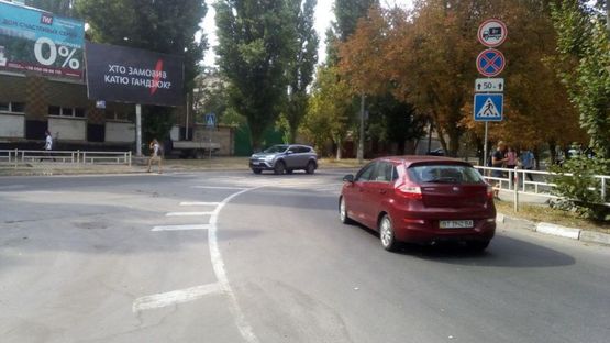 Фото рекламной плоскости по адресу Університетська вул./Івана Мозгового площа Фото рекламной плоскости по адресу Університетська вул./Івана Мозгового площа