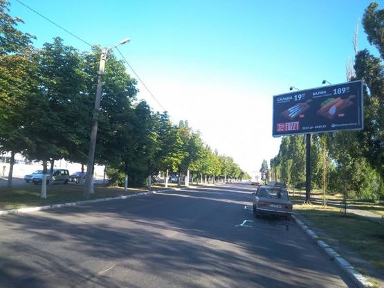 Фото рекламной плоскости по адресу ул. Киевская, 87 ( район торгового центра «Новая линия») Фото рекламной плоскости по адресу ул. Киевская, 87 ( район торгового центра «Новая линия»)
