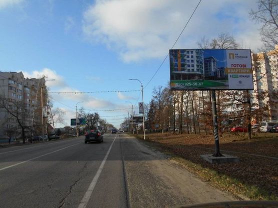 Фото рекламной плоскости по адресу м. Буча, траса М07, км 29+000 право, вул. Нове Шосе,16, напрямок ТЦ Модуль, Нова Лінія, ЕКО Маркет-Модуль Фото рекламной плоскости по адресу м. Буча, траса М07, км 29+000 право, вул. Нове Шосе,16, напрямок ТЦ Модуль, Нова Лінія, ЕКО Маркет-Модуль
