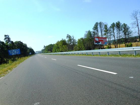 Фото рекламной плоскости по адресу Новообухівська траса, км 31+050 право, элитный частный сектор, возле с. Великі Дмитровичі, ресторан Абу-Даби Фото рекламной плоскости по адресу Новообухівська траса, км 31+050 право, элитный частный сектор, возле с. Великі Дмитровичі, ресторан Абу-Даби