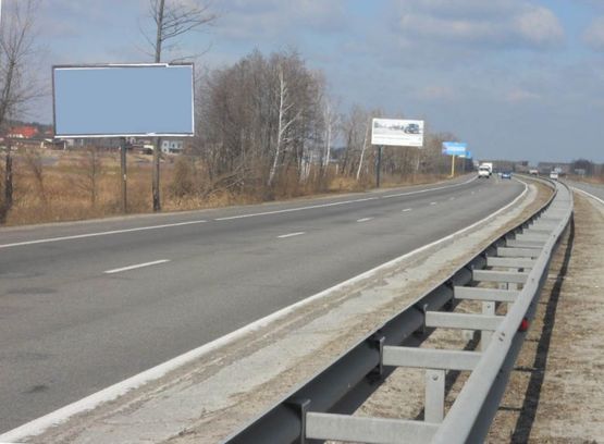 Фото рекламной плоскости по адресу Новообухівська траса, км 31+050  право, элитный частный сектор, возле с. Великі Дмитровичі, ресторан Абу-Даби