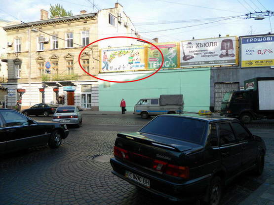 Фото рекламной плоскости по адресу вул.Франка, 41 (зліва)
