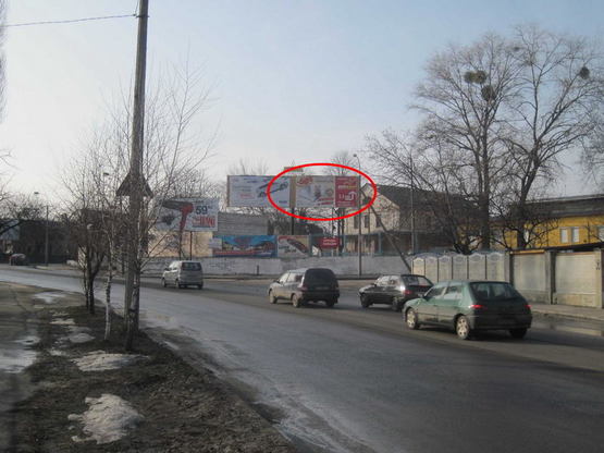 Фото рекламної площини за адресою вул. Поповича - Чернишова  ( ав/рем зав)