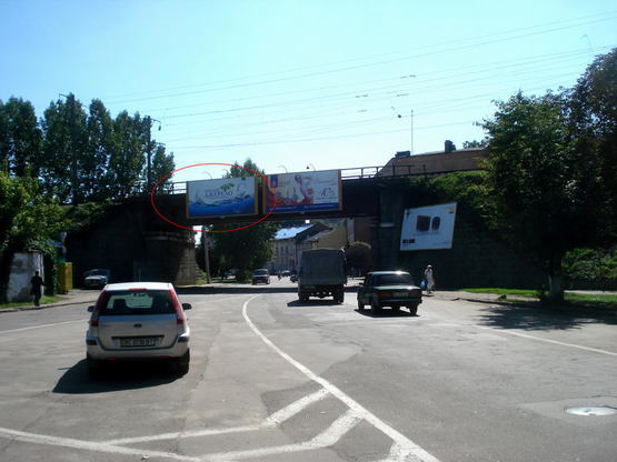 Фото рекламної площини за адресою Джерельна (міст, до "Краківського ринку") лівий