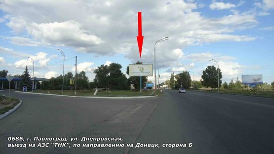 Фото рекламної площини за адресою ул. Днепровская, выезд из АЗС ТНК, по направлению на Донецк
