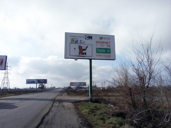 Фото рекламной плоскости по адресу ул.Сучкова в районе ж/д переезда