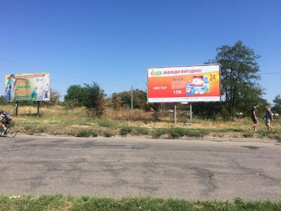 Фото рекламной плоскости по адресу пр. инж.Преображенского-пр. Юбилейный, кольцо, второй справа на кольце Фото рекламной плоскости по адресу пр. инж.Преображенского-пр. Юбилейный, кольцо, второй справа на кольце