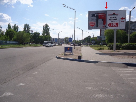 Фото рекламной плоскости по адресу Паникахи ул. 1, возле АТБ-маркет, выезд на Запорожское шоссе, в центр