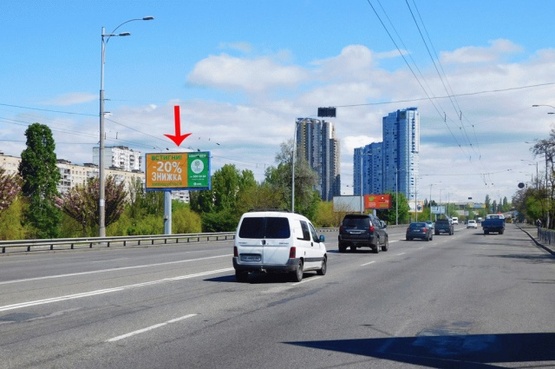 Фото рекламної площини за адресою Воссоединения пр-т, 5-й от моста Патона, ж/м Русановка, из центра