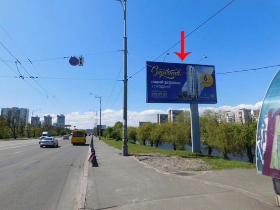 Фото рекламной плоскости по адресу Воссоединения пр-т, 7-й от моста Патона, ж/м Русановка, в центр