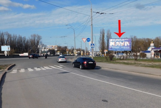 Фото рекламної площини за адресою Одесская пл., возле пр-та Глушкова, к Экспоцентру Украины, в центр