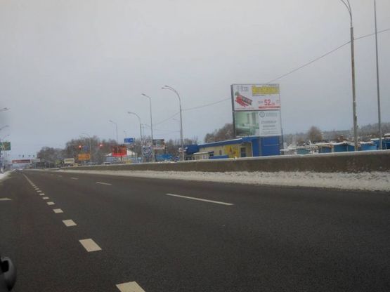 Фото рекламної площини за адресою Дніпровське шосе, 250 м після поворота на с. Лісники, траса Н-01 "Київ-Знам'янка", км 20+900 право, перед поворотом Лісники, перед АТБ, ринок Фото рекламної площини за адресою Дніпровське шосе, 250 м після поворота на с. Лісники, траса Н-01 "Київ-Знам'янка", км 20+900 право, перед поворотом Лісники, перед АТБ, ринок