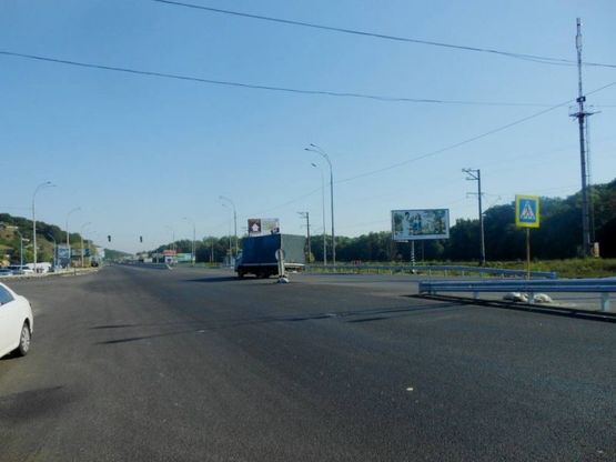 Фото рекламной плоскости по адресу Дніпровське шосе, поворот на с. Лісники, траса Н-01 "Київ-Знам'янка", км 20+680 ліво
