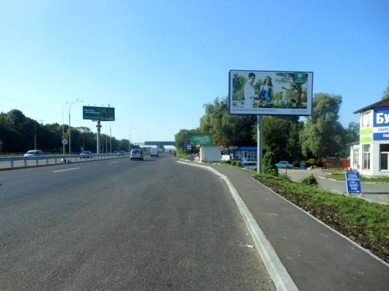 Фото рекламної площини за адресою Дніпровське шосе, поворот на с. Лісники, траса Н-01 "Київ-Знам'янка", км 20+850 право, біля "АТБ"