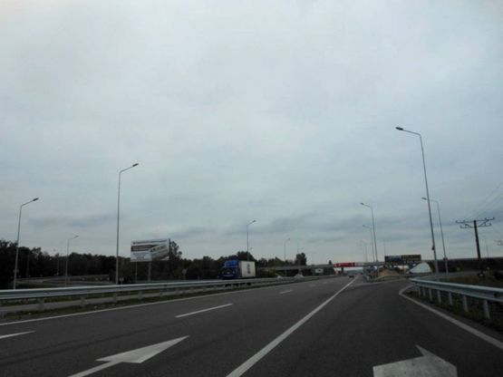 Фото рекламной плоскости по адресу Новообухівська траса, поворот на с.Креничі, км 25+100 лево