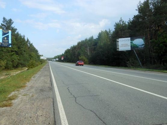 Фото рекламної площини за адресою Конча-Заспа, траса Р-02, км 34+900 ліво, поворот на с. Плюти