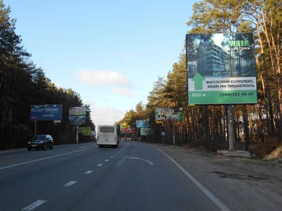 Фото рекламной плоскости по адресу м. Буча, траса М07, км 24+100 право,  вул. Шевченка, ЖК "Авіатор", напрямок з Ірпеня, в'їзд в Бучу,   200м за поворотом на Ірпінь, Гостомель
