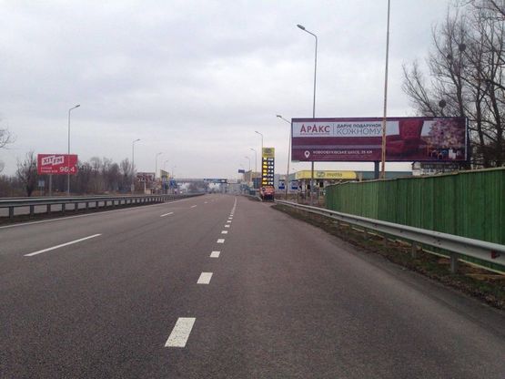 Фото рекламной плоскости по адресу Дніпровське шосе, км 23+200 право,  перед поворотом на с. Ходосіївка, АЗС БРСМ, садовый центр "Інтерфлора", "МегаМаркет-Ходосіївка"