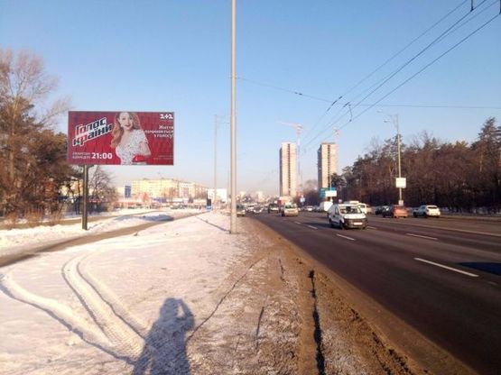 Фото рекламної площини за адресою Братиславская ул. (перед въездом к АЗС ANP от Ленинградской пл.)
