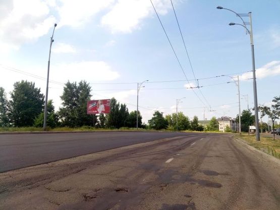 Фото рекламной плоскости по адресу Драйзера Т. ул., 46 (напротив)