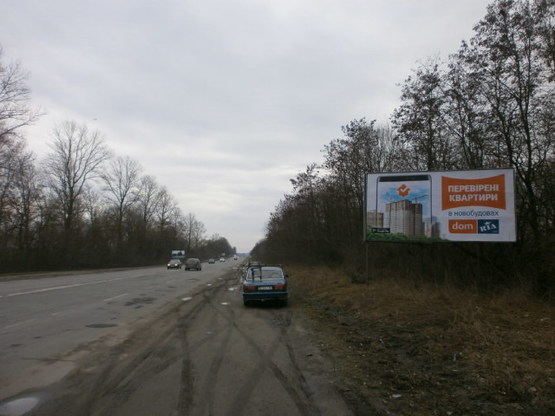 Фото рекламной плоскости по адресу Хмельницька траса 6 А (з міста)