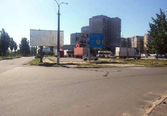 Фото рекламної площини за адресою Дружбы Народов пр. - Строителей (рынок)