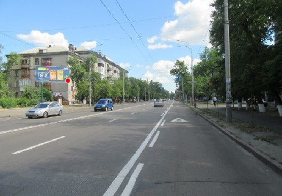 Фото рекламної площини за адресою Строителей ул., 28