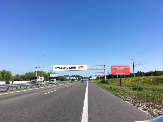 Фото рекламной плоскости по адресу Дніпровське шосе, територія під котеджну забудову, траса Н-01 "Київ-Знам'янка", км 22+200  ліво Фото рекламной плоскости по адресу Дніпровське шосе, територія під котеджну забудову, траса Н-01 "Київ-Знам'янка", км 22+200  ліво