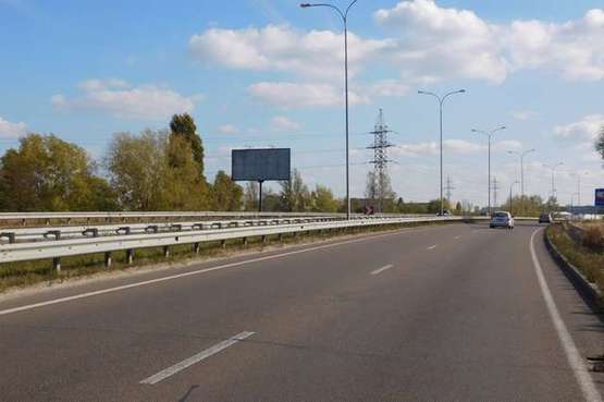 Фото рекламной плоскости по адресу Богатирська вул., 550 метрів від заправки "ОККО" (в напрямку Києва)