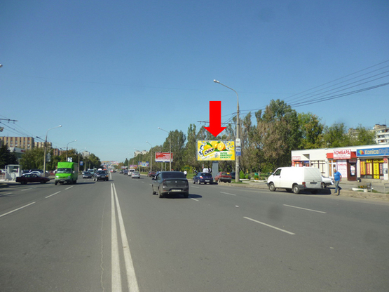 Фото рекламной плоскости по адресу Юбилейный пр. (бывш. 50 лет ВЛКСМ пр.), 56 / Тракторостроителей пр., ТРЦ "Украина", супермаркеты "Фокстрот", "Varus", рынок, из центра Фото рекламной плоскости по адресу Юбилейный пр. (бывш. 50 лет ВЛКСМ пр.), 56 / Тракторостроителей пр., ТРЦ "Украина", супермаркеты "Фокстрот", "Varus", рынок, из центра