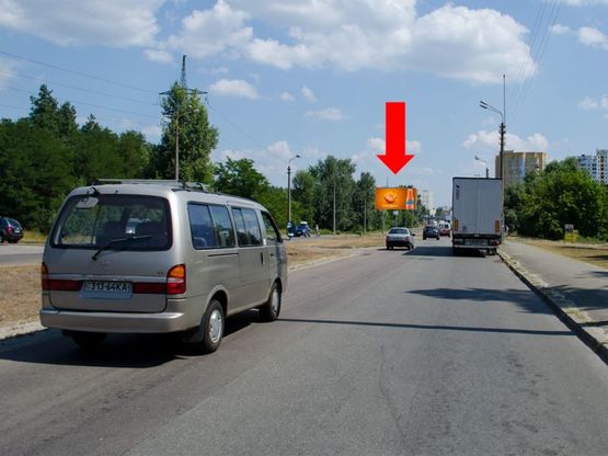 Фото рекламної площини за адресою Навои пр., разделитель, щит №2, в сторону рынка "Юность"