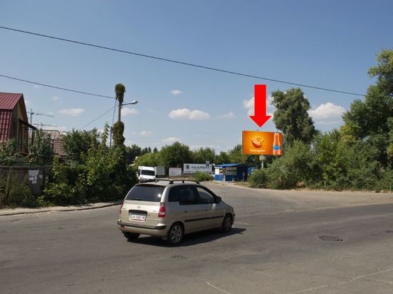 Фото рекламной плоскости по адресу Комбинатная ул. / Каховская ул., единственный въезд в Русановские сады