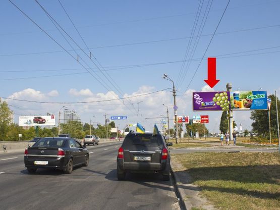 Фото рекламной плоскости по адресу Бандеры пр. (бывш. Московский пр.), напротив ТЦ "Метро", из центра, левый Фото рекламной плоскости по адресу Бандеры пр. (бывш. Московский пр.), напротив ТЦ "Метро", из центра, левый