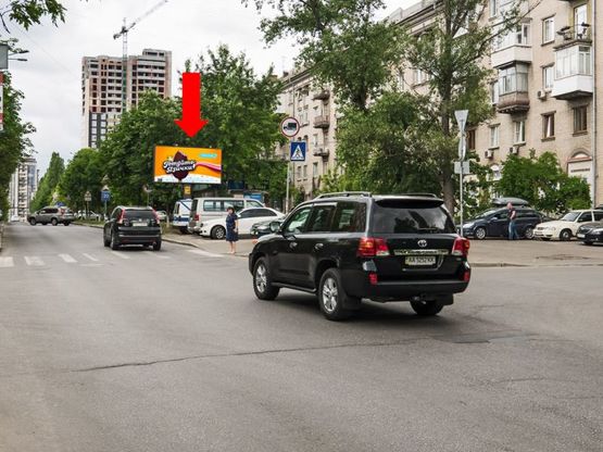 Фото рекламной плоскости по адресу Иоанна Павла II ул. (бывш. Лумумбы ул.), 19 / Чигорина ул., в сторону Б. Васильковская ул. (бывш. Красноармейская ул.)