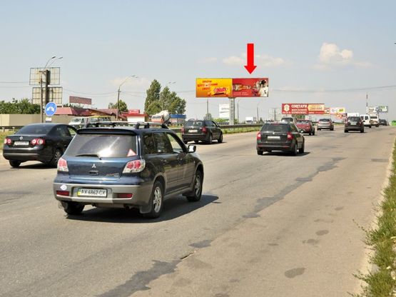 Фото рекламної площини за адресою Кольцевая дорога - Зодчих ул., 30, разделитель, возле рынка "Борщаговский", в сторону Победы пр., правая