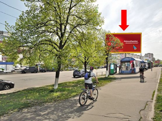 Фото рекламной плоскости по адресу Маяковского пр., 26, возле универсама "Фестивальный", в сторону Драйзера ул.