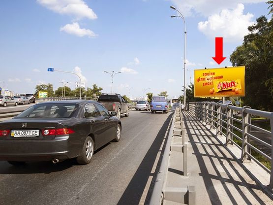 Фото рекламной плоскости по адресу Дружбы Народов бул., съезд на Наднепрянское шоссе в сторону мост Южный