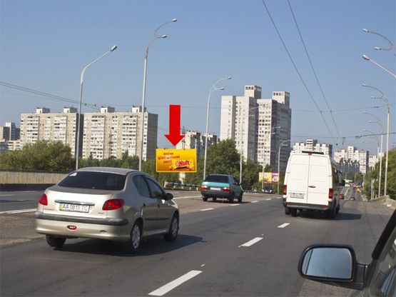 Фото рекламной плоскости по адресу Полярная ул., мост, в сторону Вышгородская ул.