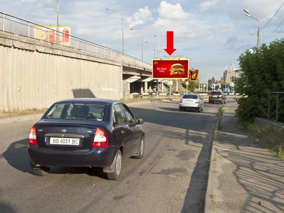 Фото рекламної площини за адресою Богатырская ул., в сторону Петровки, супермаркет "Fozzy", возле моста Фото рекламної площини за адресою Богатырская ул., в сторону Петровки, супермаркет "Fozzy", возле моста