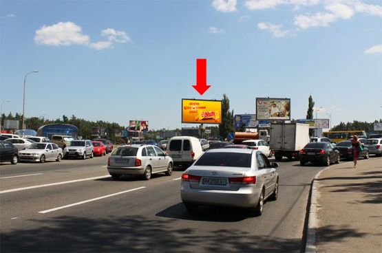 Фото рекламної площини за адресою Харьковская пл., разделитель, выезд с Харьковского шоссе в сторону Бажана пр.